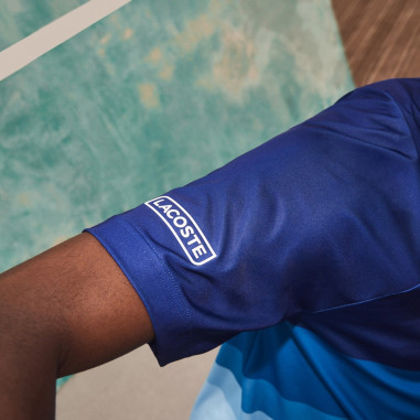 Polo LACOSTE Homme SPORT DJOKOVIC NEW YORK Bleu...